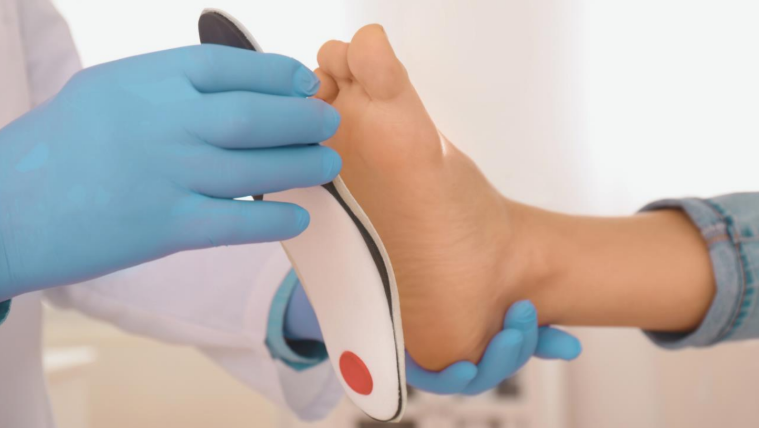 orthotic being applied