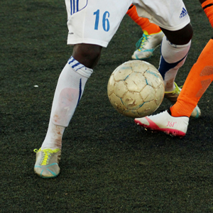 Soccer player representing athletes treated for sports injuries.